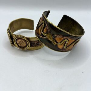 Lot of two Creative Copper and Mid Century Modernist, copper and brass cuffs